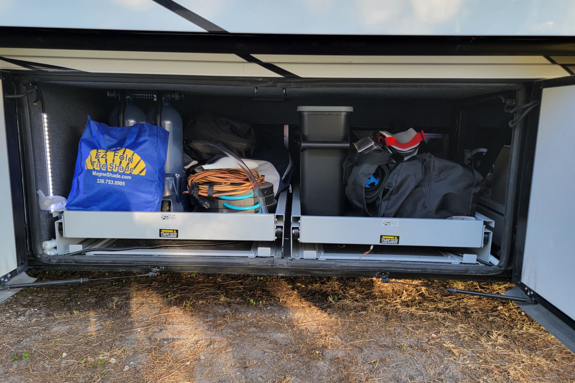 Organized RV storage with heavier items placed low and centered